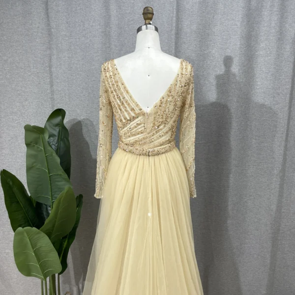 Gold wedding dresses: Ume Luxury Dubai Golden Evening Dress with Overskirt - Image 2